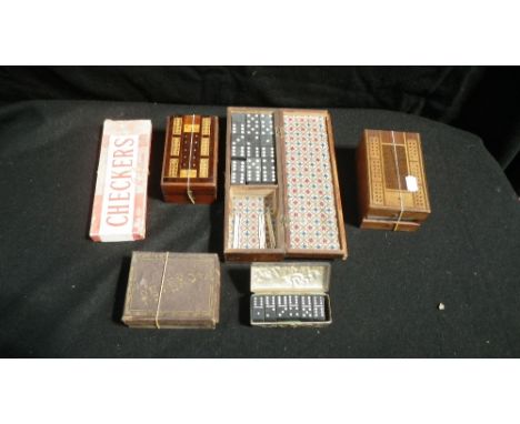 A collection of cribbage boards and other games