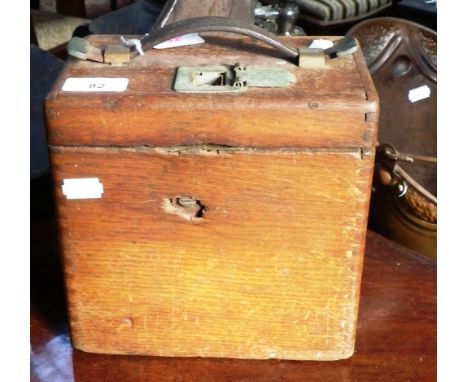 A vintage oak cased pigeon racing clock 