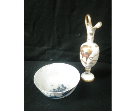 A Worcester 'Landslip' pattern bowl and a gilt decorated ewer with birds