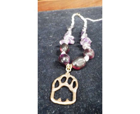 Mat Bronze (Denis Matthews): A lion paw bronze pendant with amethyst and cultured pearl necklace in the original box