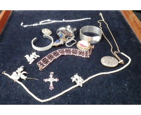 A solid silver flower engraved bangle and a collection of costume jewellery