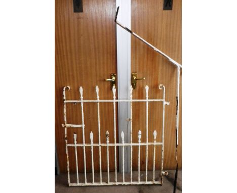 A 19th century wrought-iron gate, 37" high x 36" wide (max), and a wrought-iron doorstep handrail