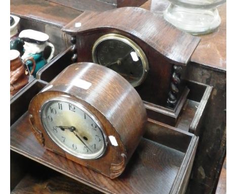 A 1920s oak cased mantel clock with polished brass dial and another similar 