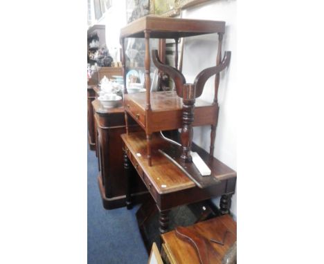 A 19th century mahogany washstand on reeded legs, a Regency two tier what-not section, a commode and a Davenport with later t