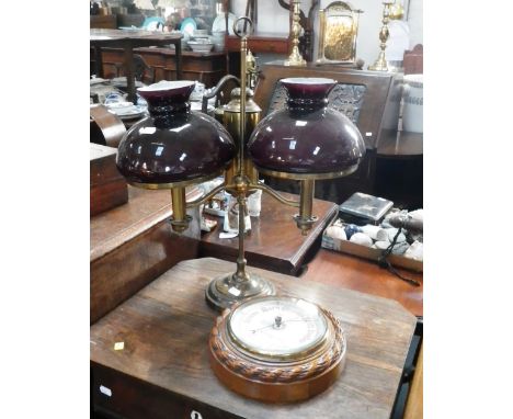 A Victorian oak cased barometer inscribed " J. Trotter  Barry & Sons  Cardiff" and a brass student's lamp fitted for electric
