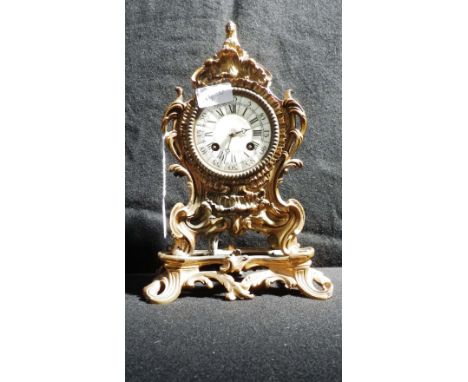 A 19th century French gilt spelter mantel clock decorated with a sphinx 