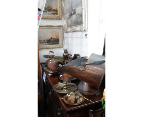 A 19th century copper helmet coal scuttle, copper kettles and similar metalware