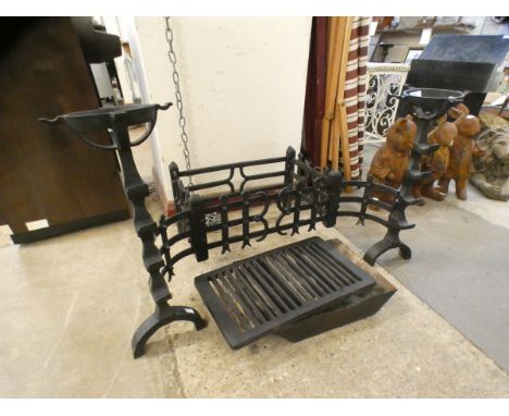 A Victorian style cast iron fire grate 