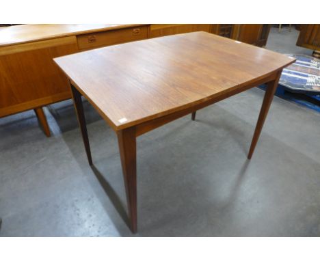 A Lebus teak extending dining table 