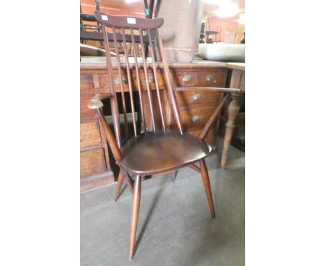 An Ercol Golden Dawn elm and beech Goldsmith chair 