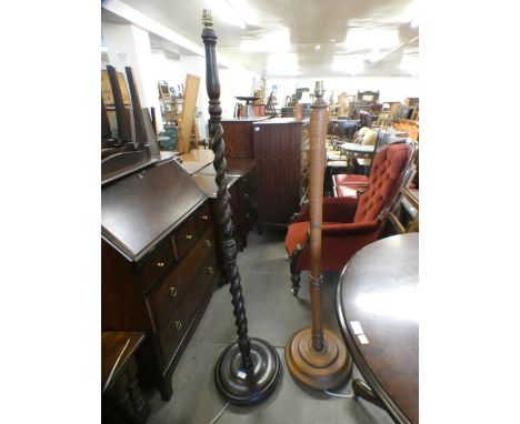 An oak barleytwist standard lamp and one other 