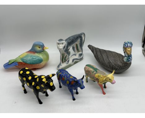 Collection of Figurines to include Rye Pottery Monkey, Hollohaza Hungary Duck, Pedralba Valencia Duck, Three CowParade Figure