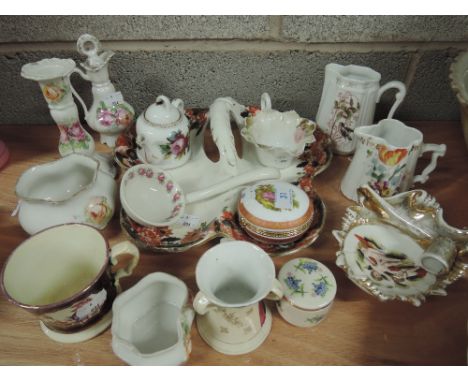 A selection of ceramics including candlestick and trinkets