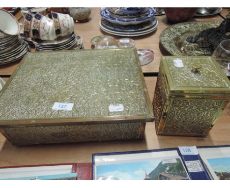 A brass jewellery box and tea caddy