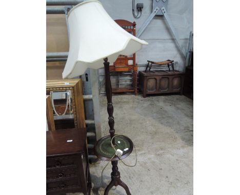 A reproduction mahogany standard lamp/wine table