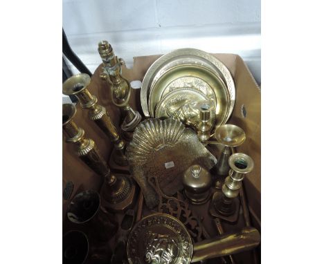 A box of brass ware including table lamp, candlesticks, trivets etc