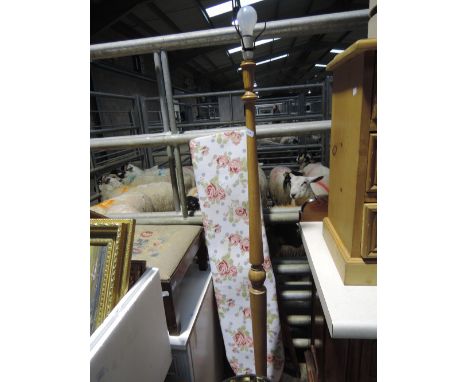 A pine standard lamp and vintage ironing board