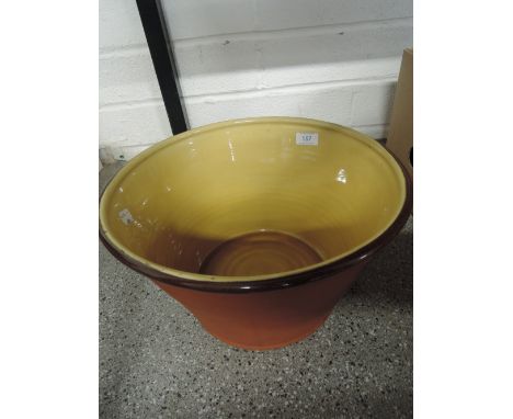 A large ceramic pot