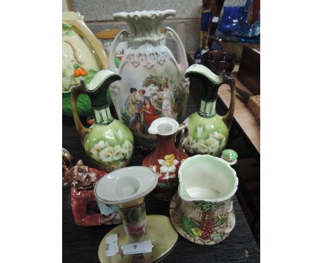 A selection of ceramic jugs and vases including Sylvac