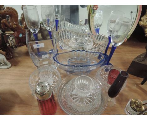 A selection of glassware including wine glasses with blue twist stems etc