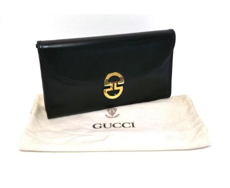 Gucci Black Leather Clutch / Shoulder Bag, with detachable strap, the flap closure secured by a sprung gilt metal clasp, the 