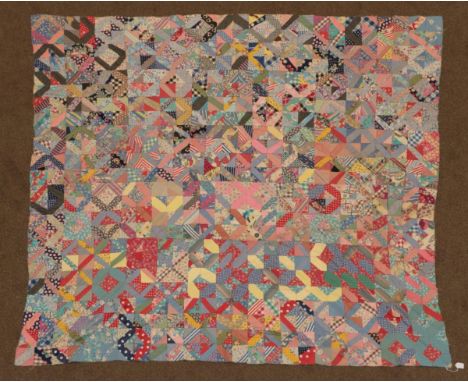 Circa 1930 African American Unfinished Patchwork Coverlet, incorporating feed sacks, shirting and dress materials, in patchwo