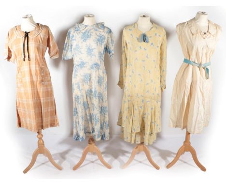 Circa 1920s Day Dresses, comprising a cream cotton sleeveless tennis dress, with embroidered tennis racket and balls to front