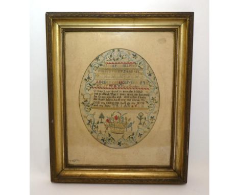 18th Century Oval Embroidered Alphabet Sampler Worked by Jane Sanders Dated 1799, incorporating the alphabet in coloured silk