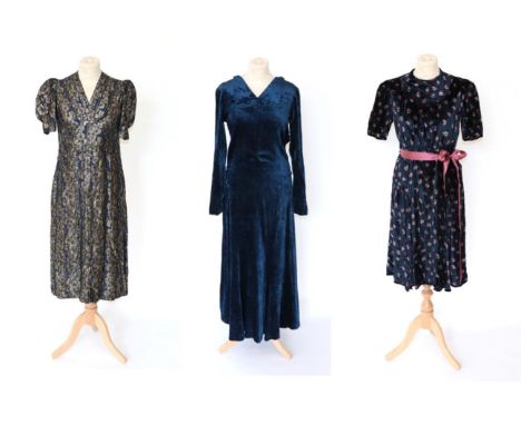 Three Circa 1930s Evening Dresses, comprising a blue and silver brocade floral dress, with bellowed short sleeves and pleated