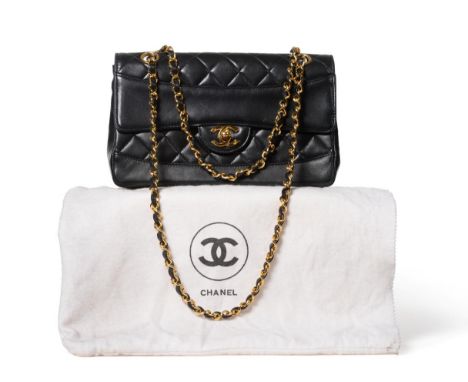 Chanel Black Quilted Lambskin Leather Handbag, Circa 1989-1991, with double chain weave handles, with interlocking 'CC' clasp