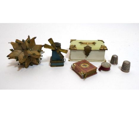 Assorted 19th Century and Later Sewing Accessories, comprising a windmill novelty tape measure made in gilt metal with a blue