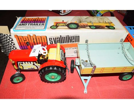 Vintage Czechoslovakian metal clockwork tractor and trailer with original box