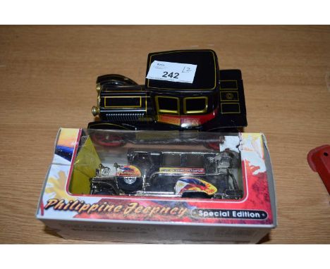 Boxed Philippines Jeepney together with a further Japanese metal model vintage car (2)