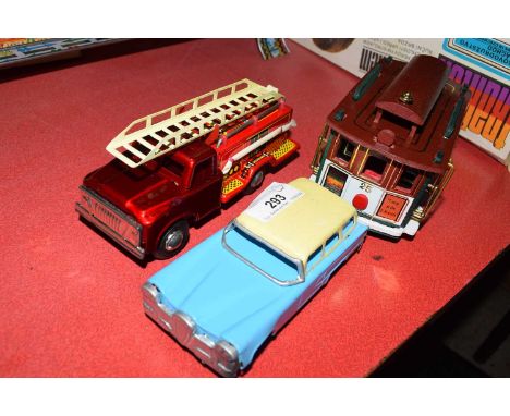 Mixed Lot : a model San Francisco tram coach, a small Chinese metal plate fire engine and a further model car (3)
