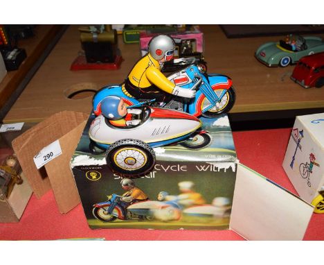 Vintage Chinese clockwork metal motorcycle with sidecar