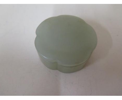 A jade lidded pot, 2cm x 8cm, in good condition 