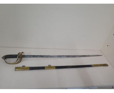 A Victorian naval sword and scabbard, sword length 89cm, some pitting and wear consistent with age 