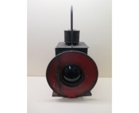A Railway train or buffer lamp with burner, 55cm tall, with age related wear, paintwork appears original 