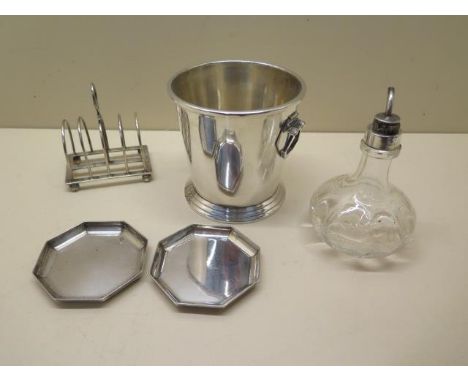 Mixed silver. A pair of octagonal dishes from H. Phillips of Aldershot, Hampshire, marked for London and a 5 bar toast rack p