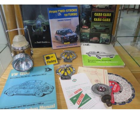 Motoring Interest: VW workshop manual books, an early RAC badge, three AA badges and a motorist lamp 
