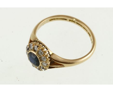 An antique 18ct H/M sapphire & diamond cluster ring, marks indistinct, approx 2.9gms, size L