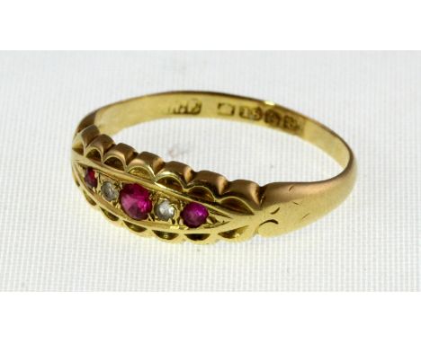 An 18ct H/M boat shaped synthetic ruby Ruby & paste set ring, Birmingham 1918, approx 2.4g, size Q
