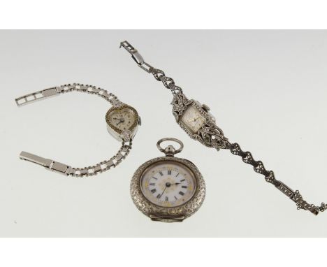A fob watch with decorated enamel dial, the case stamped 935, working, together with two marcasite set cocktail watches, one 