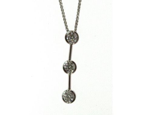 An 18ct H/M three stone diamond drop pendant & chain, approx total diamond weight 0.60ct,  