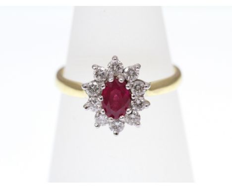 A Ruby and Diamond cluster ring, 18ct H/M, approx Diamond weight 0.50ct, approx Ruby weight 0.50ct, size M  [VAT included in 