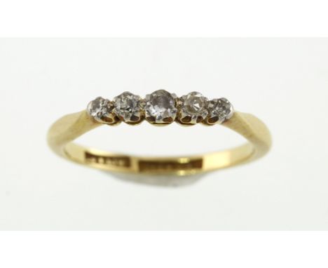 An early 20th century five-stone diamond ring, approx 0.15ct & 2.5gms, Size M & stamped 18ct & PT