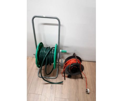 A HOSE PIPE ON REEL TOGETHER WITH AN EXTENSION