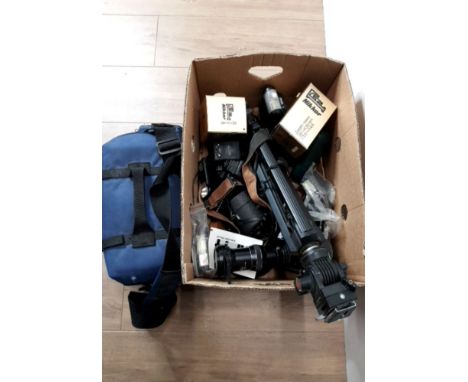 A BOX OF CAMERA EQUIPMENT INCLUDING A TRIPOD STAND