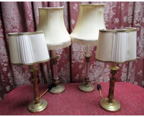 Pair of Louis XVI style cast gilt metal candlestick table lamps with urn sconces and matted tapering columns, and base H35cm 