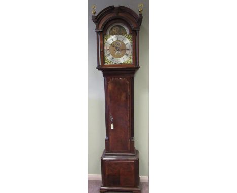 George III mahogany long case clock, moulded arched top hood with tapering column supports and brass ball and eagle finials, 